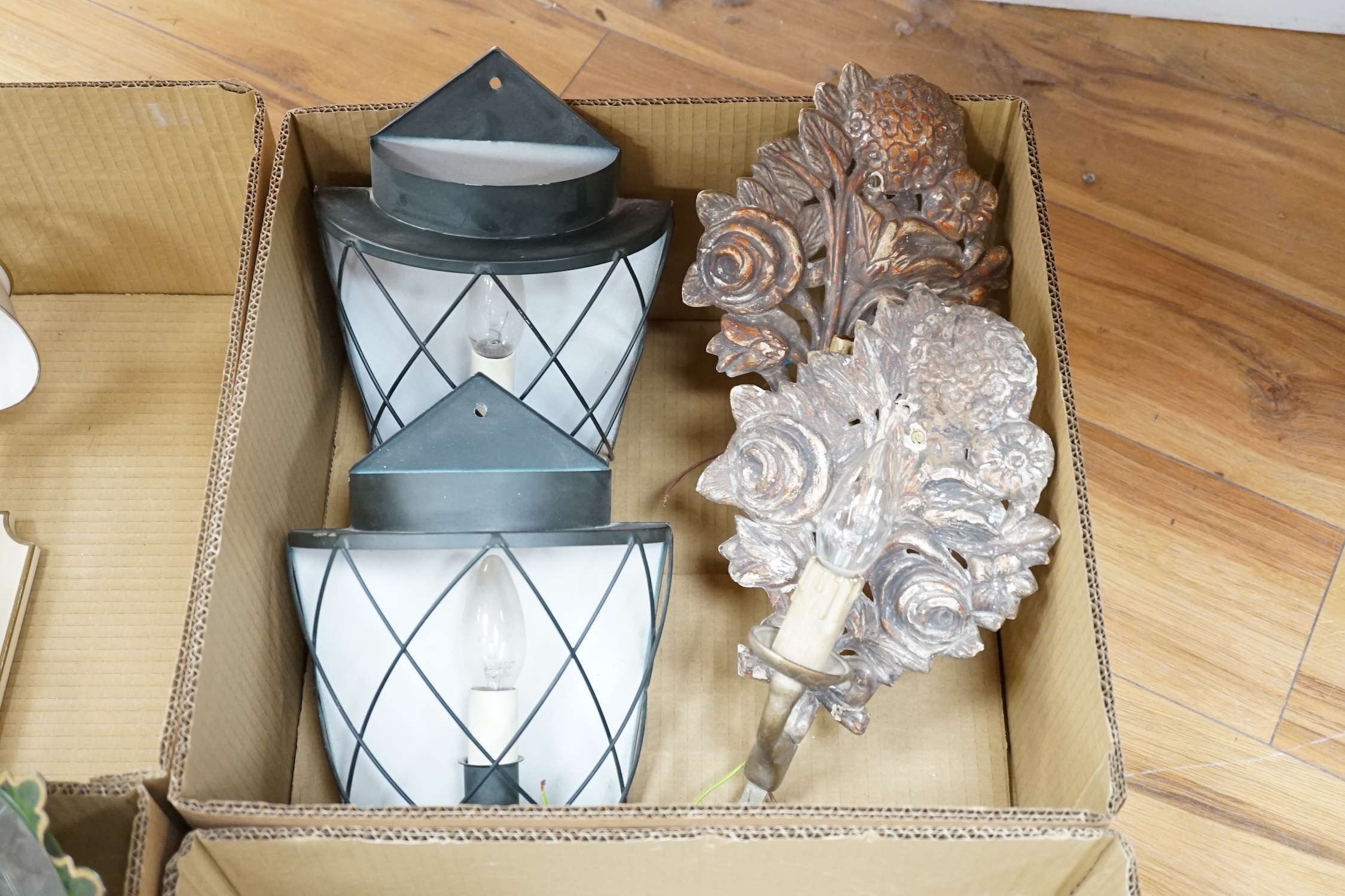 Twelve various lights: a lustre wall light, two branch chrome wall light, and glass shaded wall light, two pairs of toleware style wall lights and a similar ceiling and pair of plaster wall lights (12). Condition - fair
